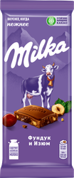 Шоколад молочный MILKA с дробленым фундуком и изюмом, 80г, крупный план