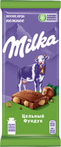 Шоколад молочный MILKA с цельным фундуком, 80г, крупный план